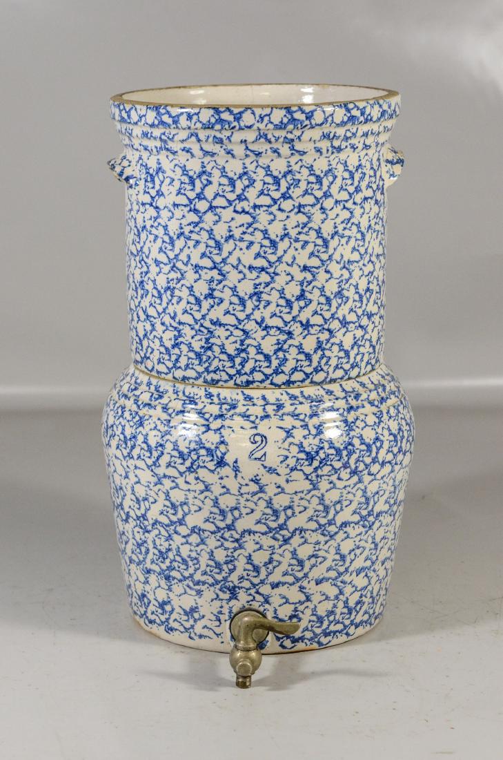 2 pc blue spongeware water cooler, lacking lid, 3": 2 pc blue spongeware water cooler, lacking lid, 3" hairline in top section, 19" high,