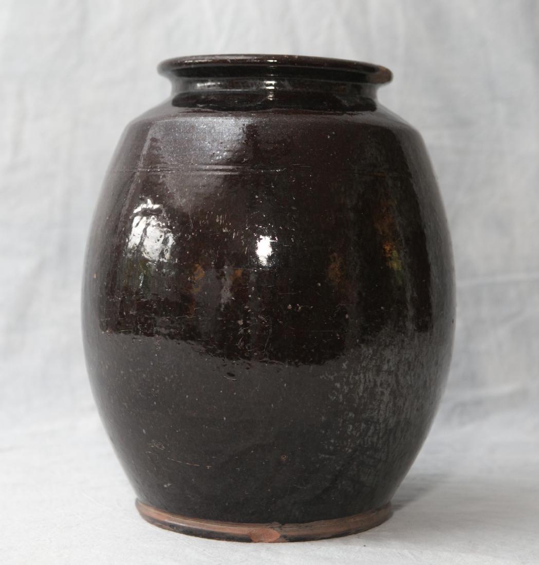 Black glazed ovoid redware jar, some chips & fritting (1 of 6)