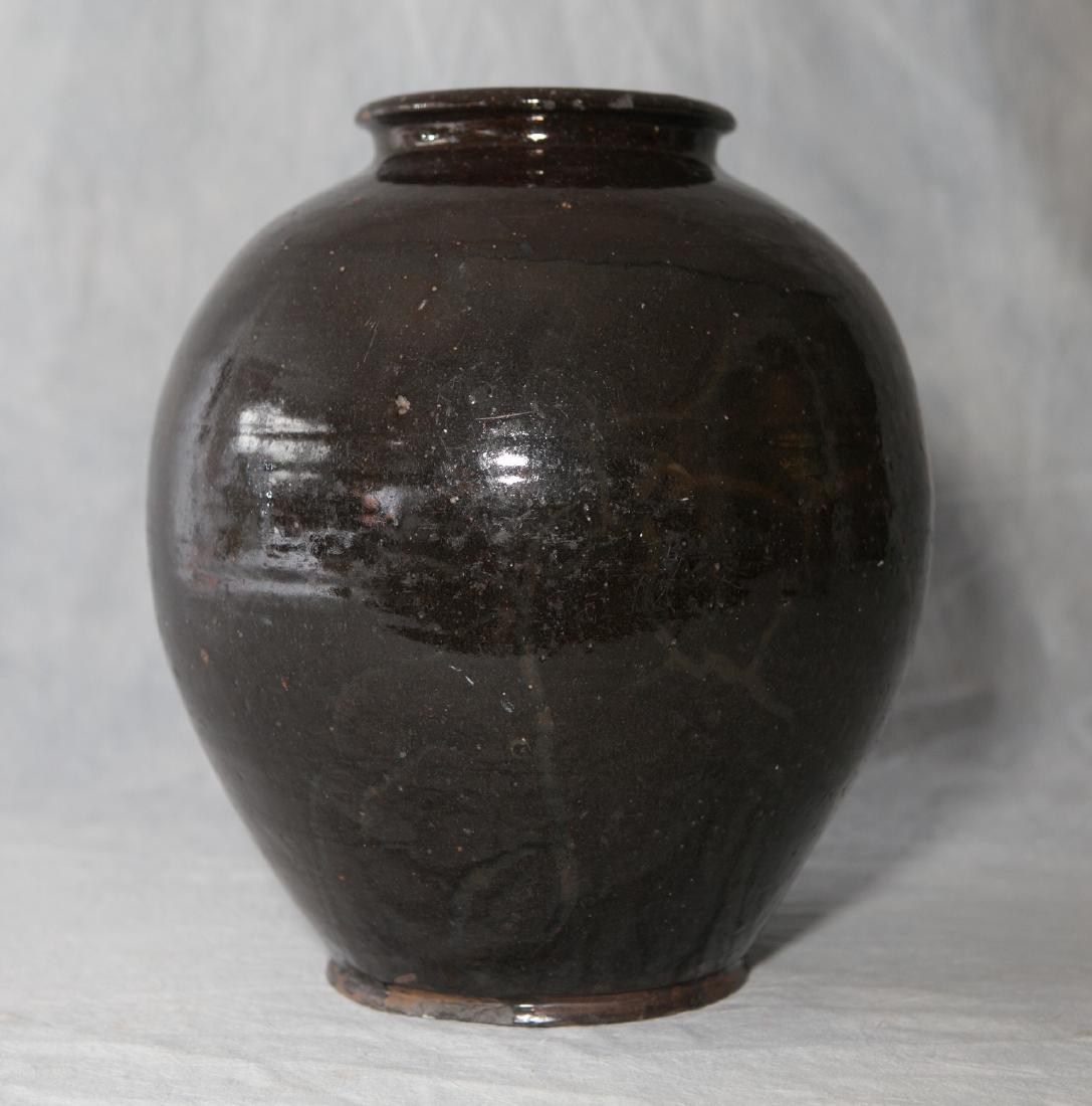 Black glazed ovoid redware jar, chips around base & top (1 of 5)