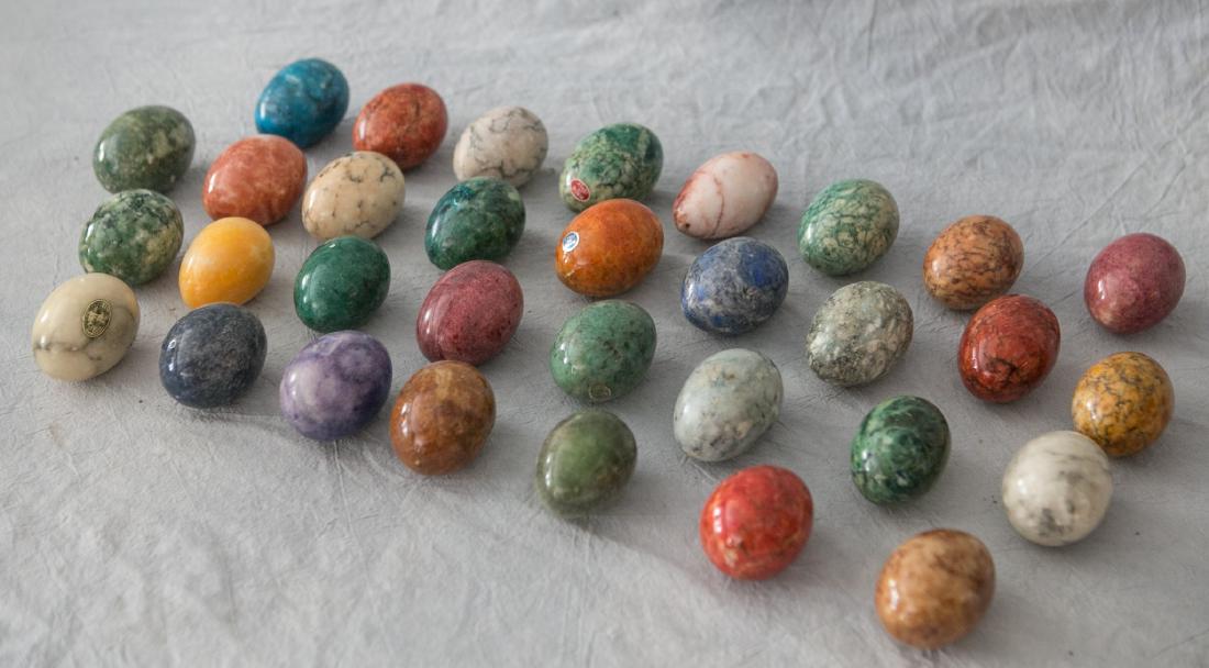 Lot of 81 alabaster & stone eggs, approx 2", photo is (1 of 3)