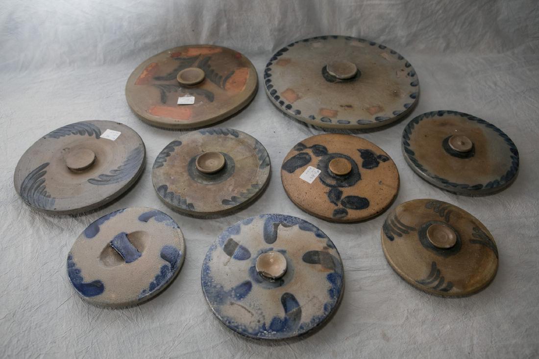 Lot of 9 blue decorated stoneware lids, some with (1 of 1)