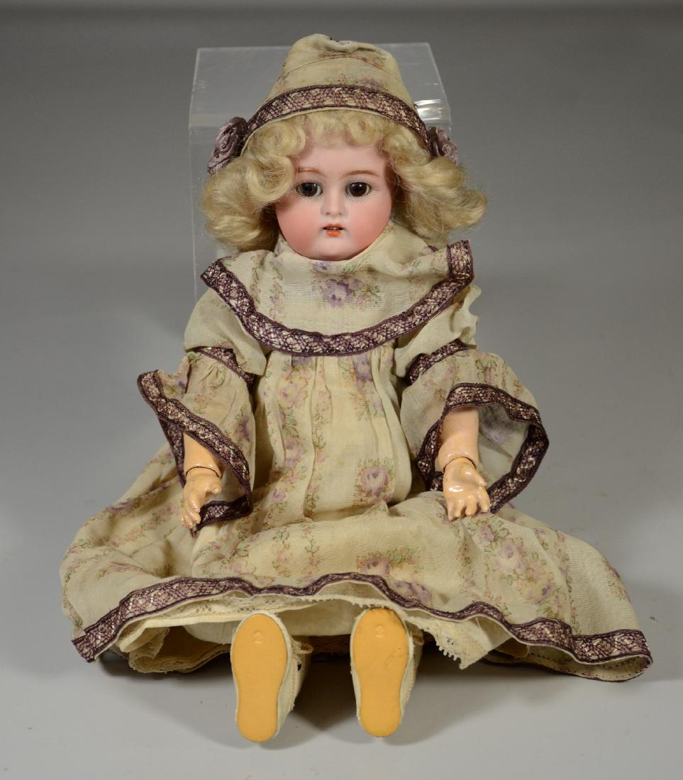 Simon & Halbig Kammer & Reinhardt bisque head doll, on: Simon & Halbig Kammer & Reinhardt bisque head doll, on original ball jointed body, original outfit, wig, brown sleep eyes, open mouth, teeth, 13" tall, Wig loose, spider crack to head