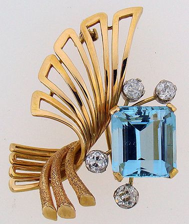 18KT Y.G. AQUAMARINE AND DIAMOND BROOCH 7.00CT
