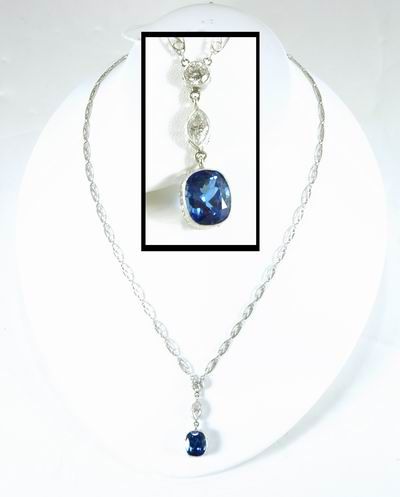 6.00CT TANZANITE AND PLATINUM DIAMOND PENDANT
