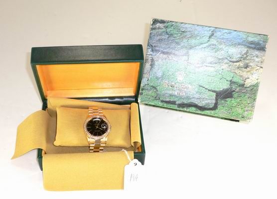 MENS ROLEX PRESIDENT DOUBLE QUICK SET DIAMOND BEZE: MENS 18KT YELLOW GOLD ROLEX PRESIDENT WITH AFTER MARKET DIAMOND BEZEL APPROX. 2.00CT DIAMONDS CIRCA MID 90'S IN LIKE NEW CONDITION HAS DOUBLE QUICK SET NEW LIST $20,000 BAND HAS VERY LITTLE IF ANY STR