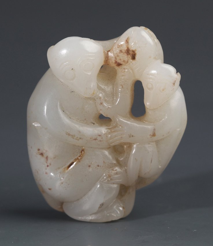 A CARVED HETIAN WHITE JADE MONKEY PENDANT (1 of 4)