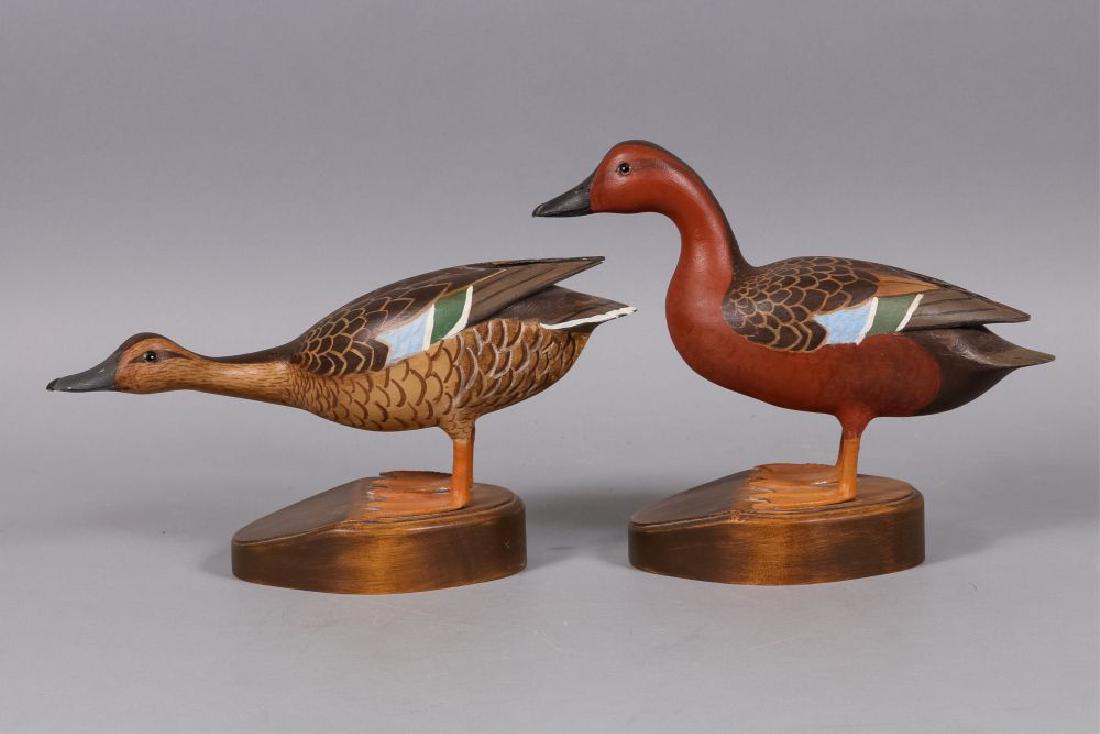 Charlie Moore Pair of Decorative Cinnamon Teal,: Dekalb, IL, Glass Eyes, Solid Bodies, Excellent Original Paint, Standing, Each Mounted on Base, Drake is 12"L x 10"T, Hen is 13.5"L x 7.5"T, Est. 200-400
