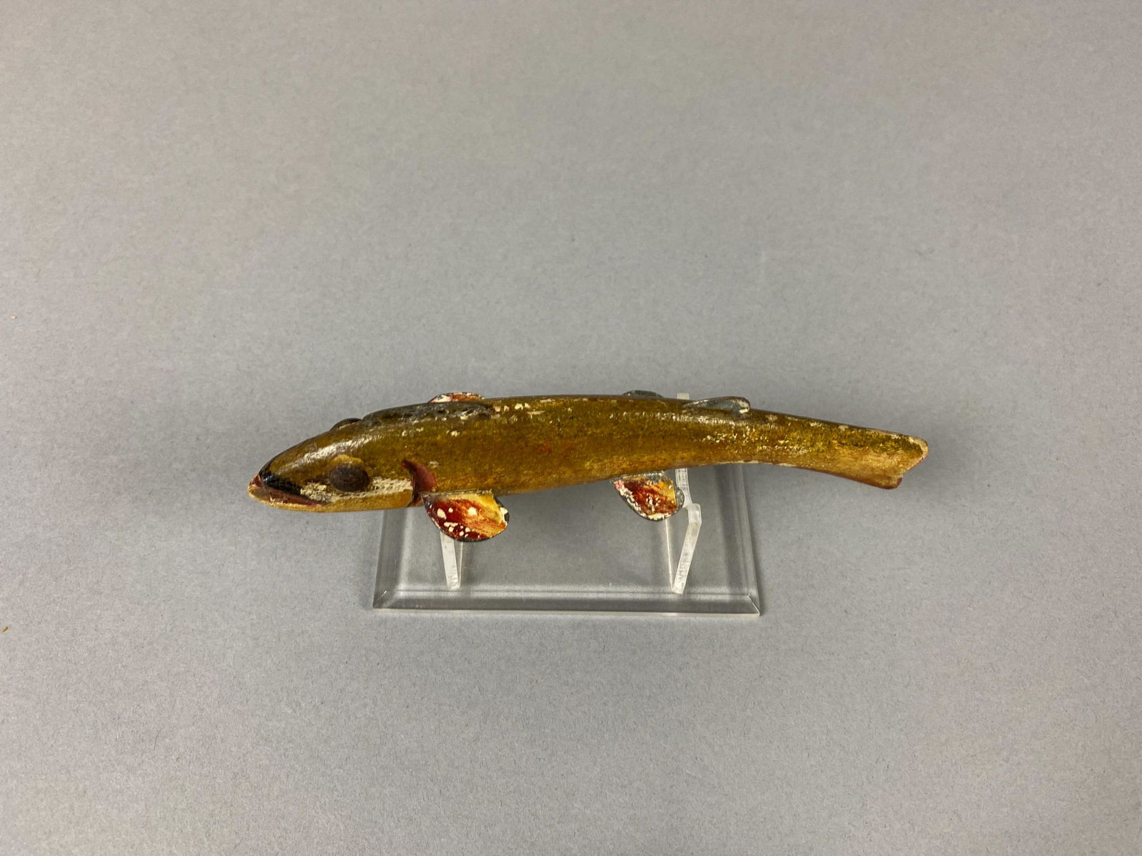 Oscar Peterson Fish Spearing Decoy, Cadillac, MI, tack: Oscar Peterson Fish Spearing Decoy, Cadillac, MI, tack eyes, relief carved gills and mouth, left sweeping carved tail & metal fins, dual lead chambers, appears to be original paint under heavy coat of