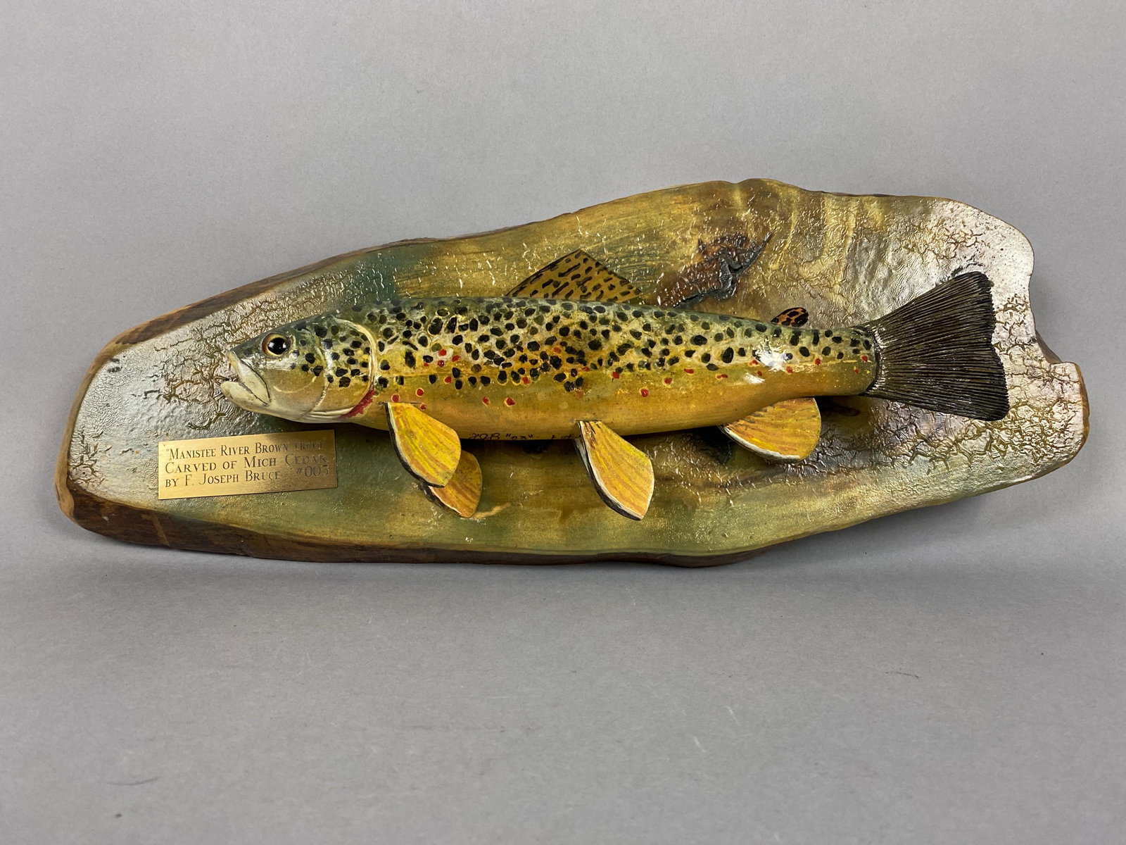 Floyd "Red" Bruce Hand Carved Brown Trout Plaque,: Floyd "Red" Bruce Hand Carved Brown Trout Plaque, Gaylord, MI, glass eyes, carved tail & metal fins, excellent original paint w/great detail, relief carved gills w/open mouth, "Manistee River Brown Tr