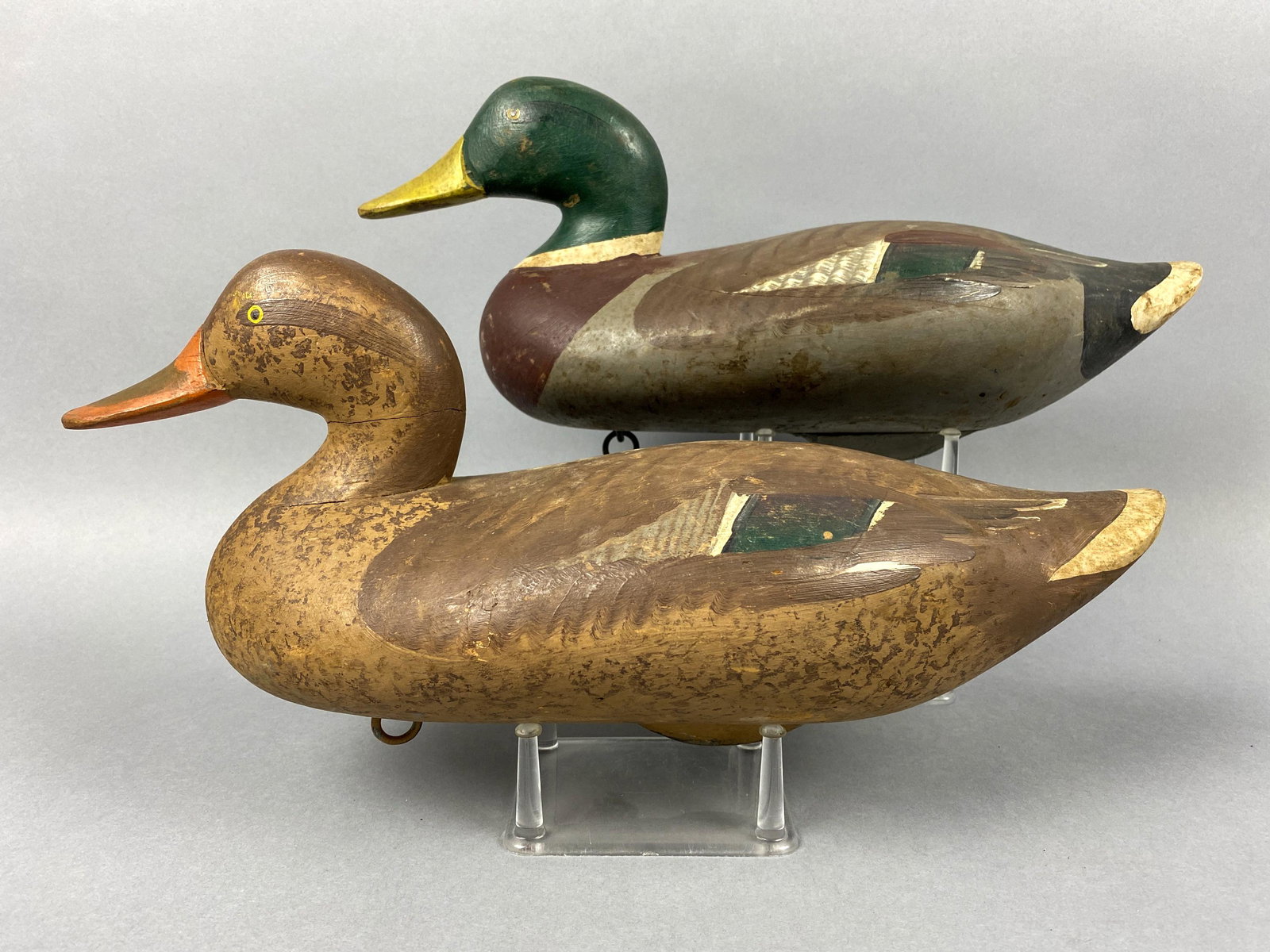 Madison Mitchell Pair of Mallard Duck Decoys, Havre de: Madison Mitchell Pair of Mallard Duck Decoys, Havre de Grace, MD, painted eyes, solid bodies, strong original paint w/light wear, hen has tight crack in neck, signed & dated 1958 on bottom in electro 