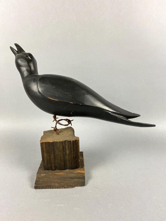 Paul Arness Hand Carved Crow on Fence Post Base, King: Paul Arness Hand Carved Crow on Fence Post Base, King City, CA, glass eyes, relief carved split tail, calling position, original paint with a few minor imperfections, 19.5"L x 16.5"T, est. 200 - 300