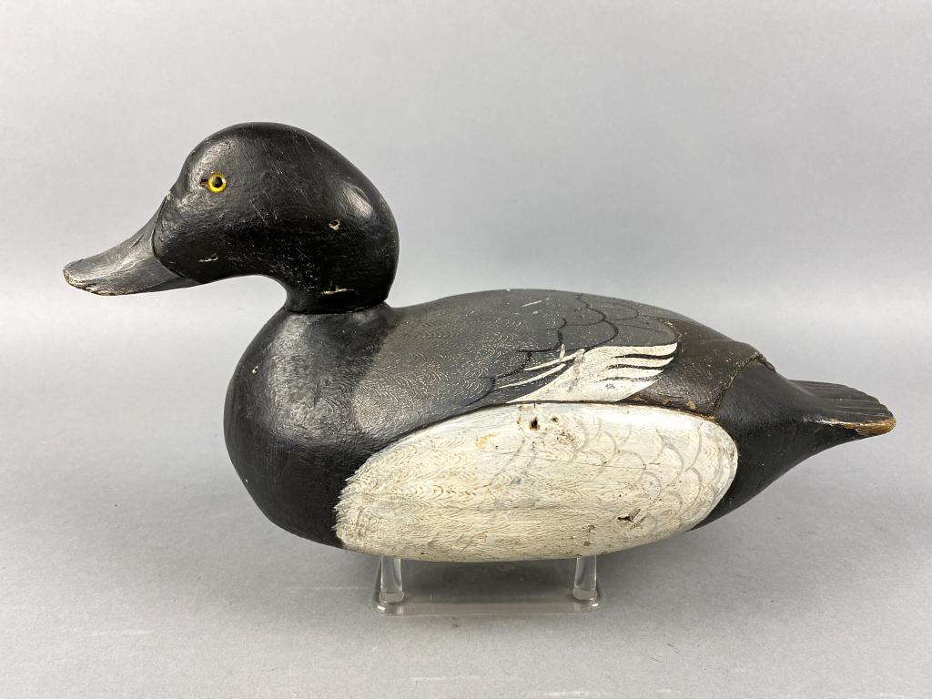 Bluebill Drake Duck Decoy by Unknown Wisconsin Carver,: Bluebill Drake Duck Decoy by Unknown Wisconsin Carver, glass eyes, solid body, working paint, light gunning wear with a few shot marks, crossed wingtips, excellent form, 14.5"L, est. Market Determined