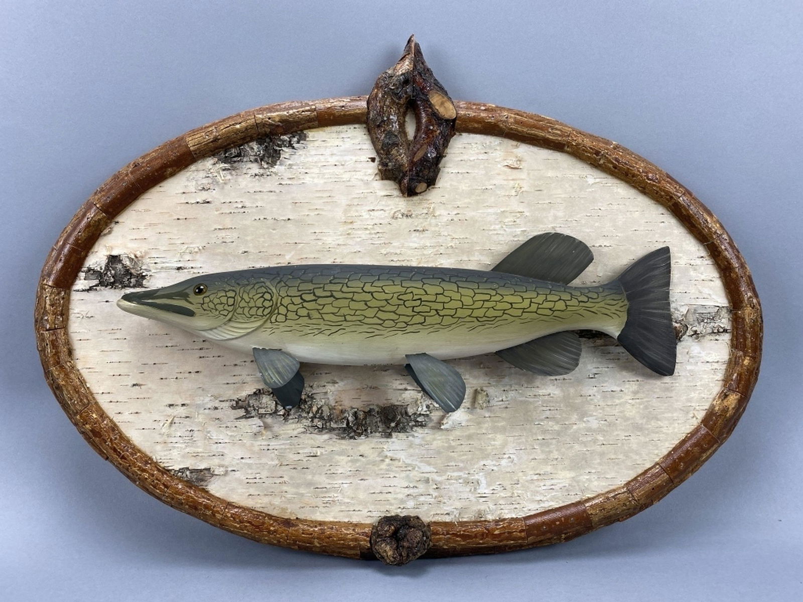 George Strunk Chain Pickerel Plaque: Glendora, NJ, glass eye, metal fins with wooden tail, excellent original paint, mounted on rustic plaque, signed on bottom, pike is 16.5"L, plaque is 22"L x 14"T, est. 400 - 700