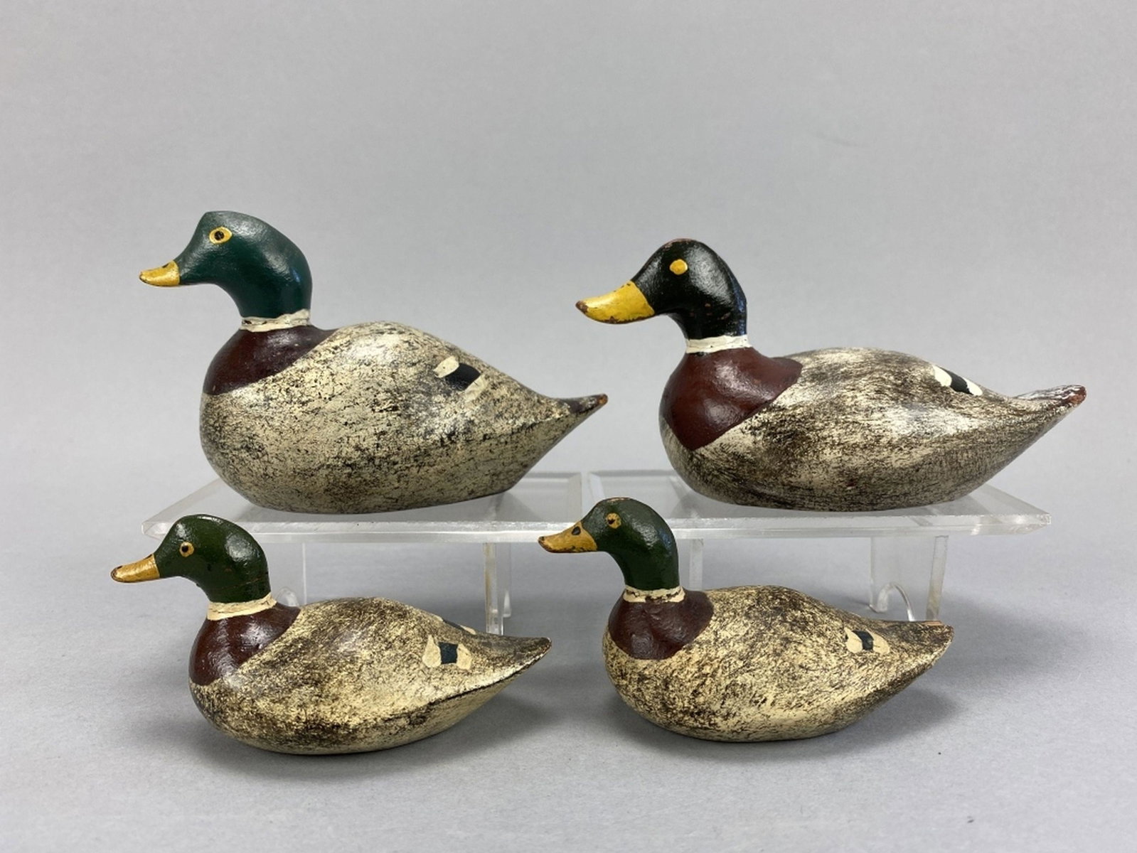 4 Mini Mallard Drakes: by unknown Wisconsin carver, overall good condition with a few small minor imperfections, sizes range from 3.5"L - 5"L, est. Market Determined