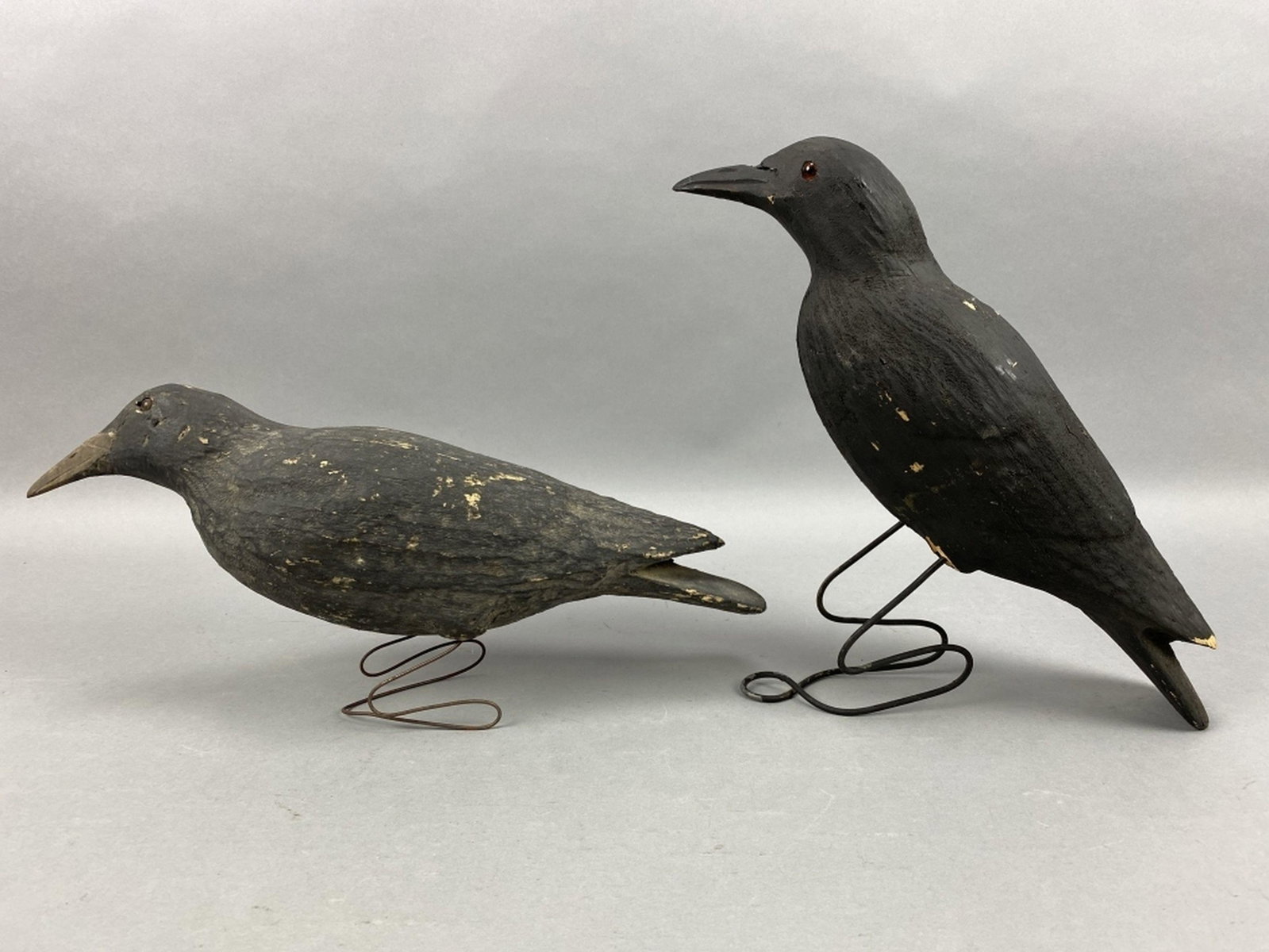 2 Herters Crow Decoys: Waseka, MN, glass eyes, balsa bodies, original paint with light gunning wear & some flaking, John Treutelaar Collection, 17"L, est. 300 - 500
