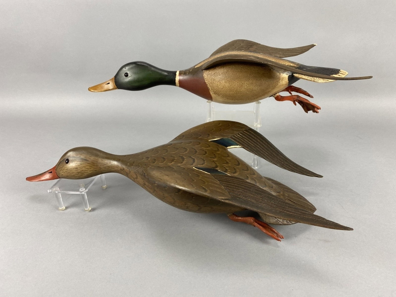 Lou Reineri Pr of Dead Hanging Mallards: Chincoteague, VA, carved eyes, solid bodies, excellent original paint with detailed feather carving, nice form in dead hanging pose, drake has small chip on right wingtip, otherwise excellent conditio