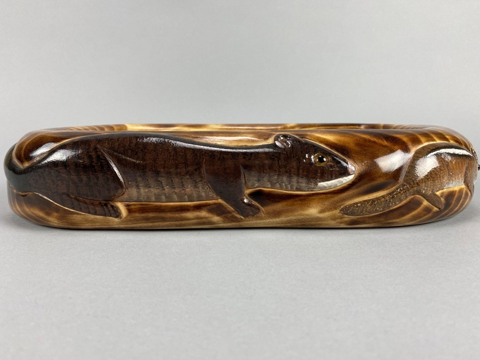 Carl Christiansen Hand Carved Bowl: Newberry, MI, bowl features beaver & hut inside with relief carved beaver, chipmunk & mouse on outside of bowl, excellent condition, makers signature on side, 13.5L x 7.5"W, est. 200 - 400