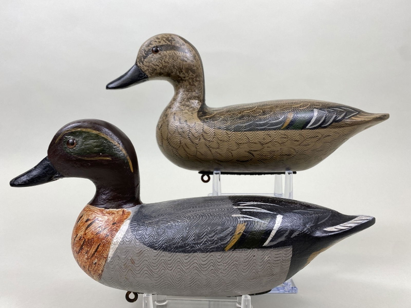 Perdew Style Pr of Green-Winged Teal: by Charlie Moore, Dekalb, IL, glass eyes, hollow bodies, excellent original paint, detailed combing on back, Perdew style lead weights, 10.5"L, est. 200 - 400