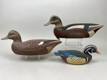 3 Duck Decoys: 1 wood duck drake by unknown carver, painted eyes, 1/2 sized solid body, original paint, nice example & 1 pr widgeon by Charles Pete Wilbur, Island Heights, NJ, glass eyes, hollow bodies, original pai