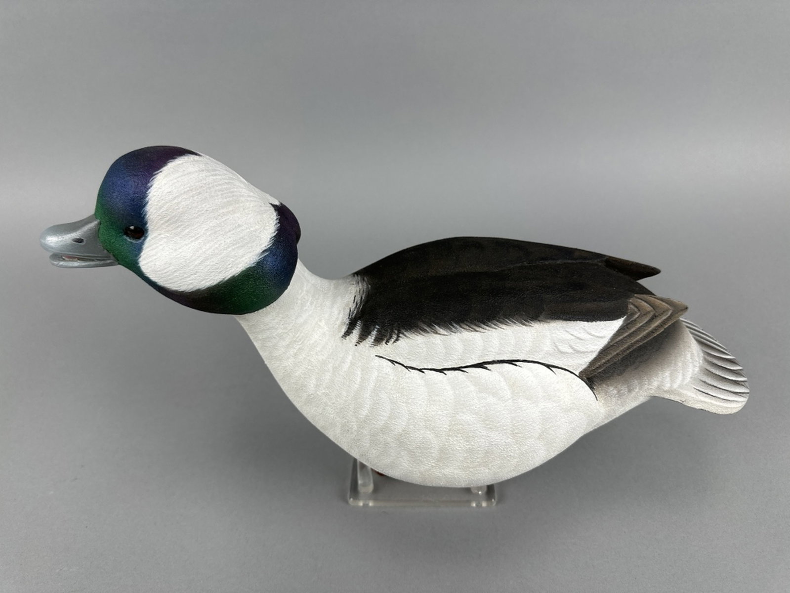Gary Hanson Bufflehead Drake Duck Decoy: Eastpointe, MI, glass eyes, solid body, excellent original paint, nice form in swimming/calling position, makers brand on bottom, 14.5"L, est. 200 - 400