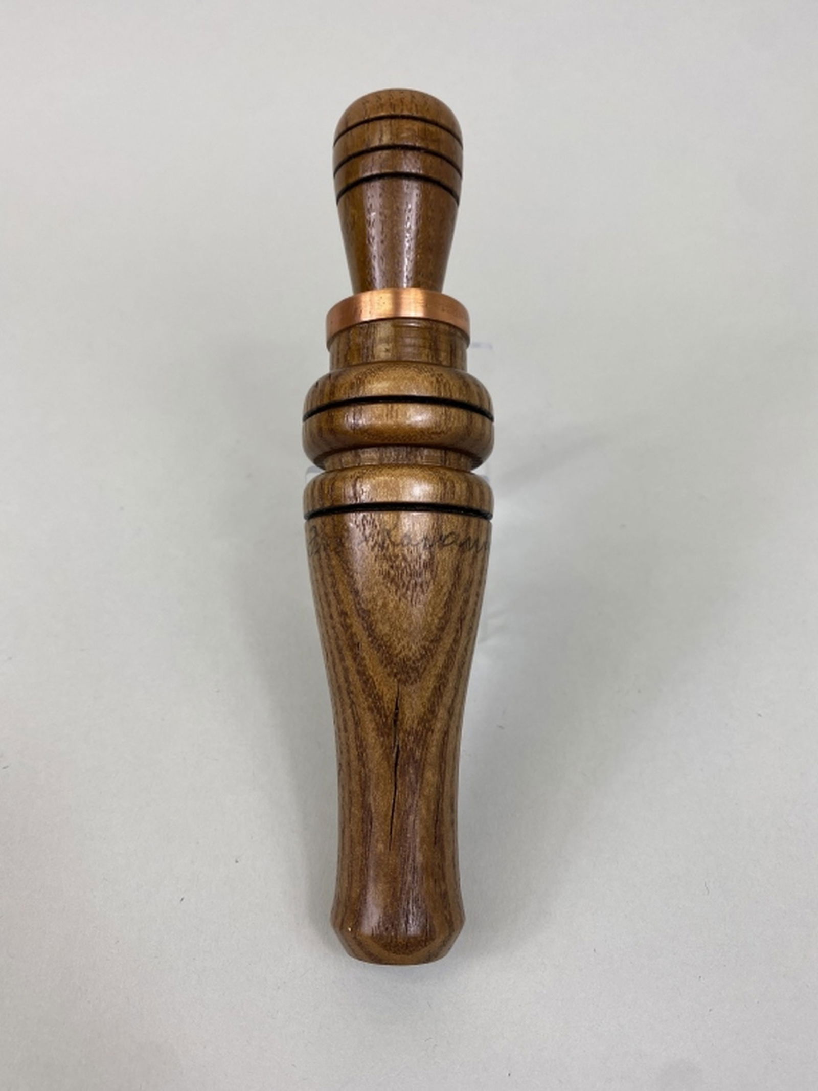Fred Korando Duck Call: Jacob, IL, plastic reed, with brass band, signed by maker, crack on barrel that doesn't go thru call, Phillip "Sonny" Cain Collection, 6.25"L, est. 150 - 250
