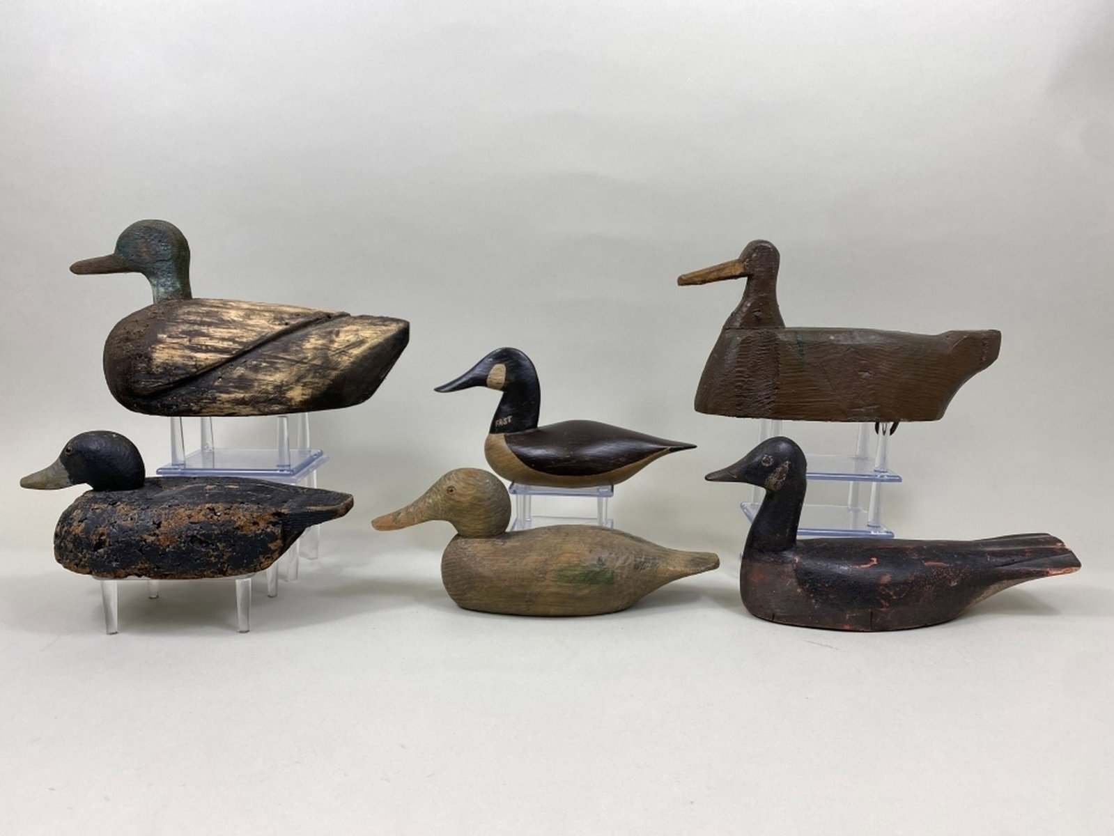 6 Decoys: various species & makers, including bluebill, mallards, Canada goose, 5 wood, 1 cork, Canada goose is original paint, others appear to be old repaint, Terry Smart Collection, 9"L - 10.5"L, est. 100 - 