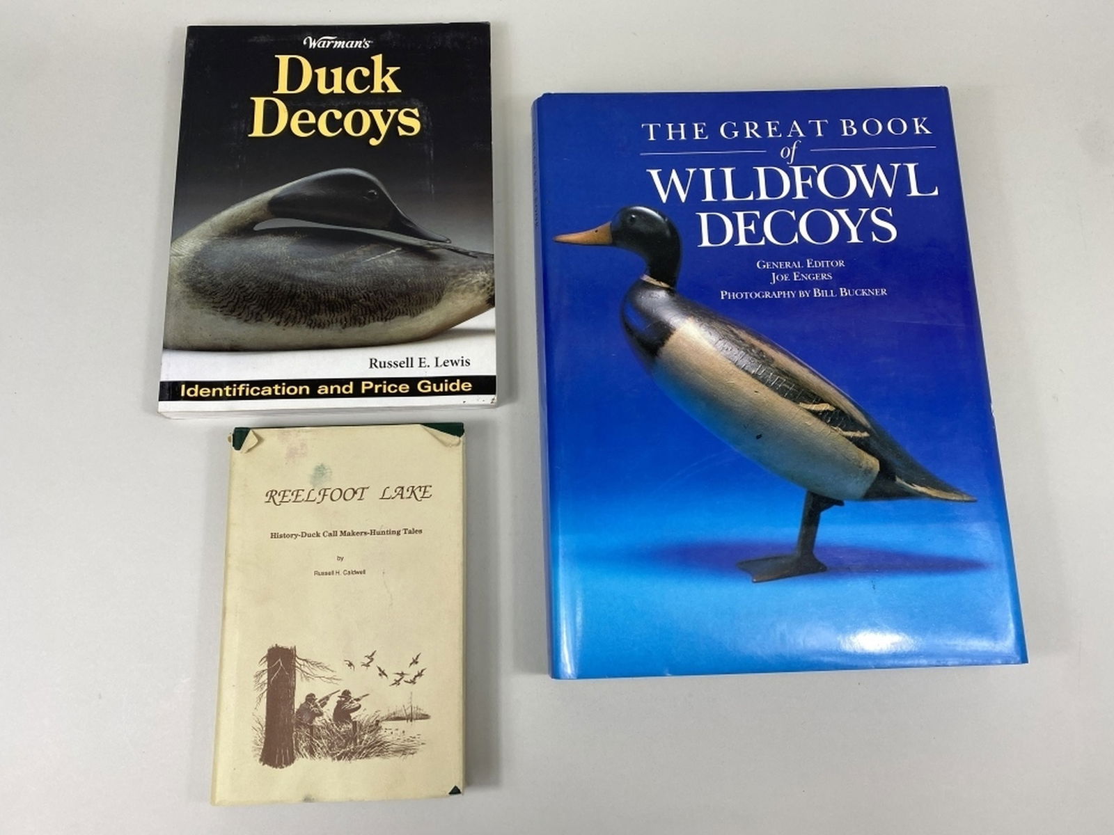 3 Reference Books: Reelfoot Lake History-Duck Call Makers-Hunting Tales by Russell H. Caldwell, The Great Book of Wildfowl Decoys General Editor Joe Engers, Warman's Duck Decoys Identification & Price Guide (soft cover)