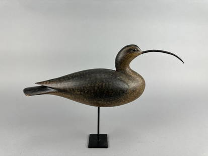 David Ward Curlew Shorebird: Essex, CT, glass eyes, solid body, strong original paint, this curlew features a metal bill, relief carved wing detail with split carved tail, hairline age crack through neck otherwise in excellent co