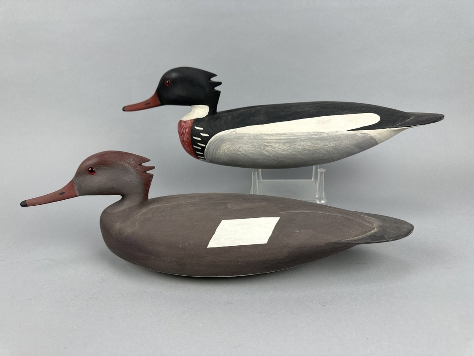 Hurley Conklin Pr of Red-Breasted Mergansers: Manahawkin, NJ, glass eyes, hollow bodies, excellent original paint, nice form with slightly turned heads, makers brand on bottom, 17"L, est. 300 - 500