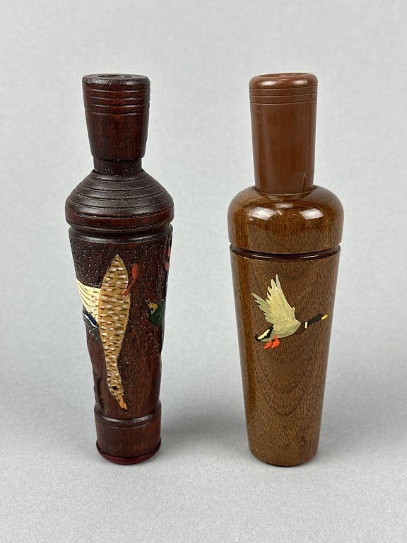 Glynn Scobey & Bud Hinck Duck Calls: 1 Bud Hinck, Washburn, IL, Perdew style duck call with 3 relief carved mallards, 6"L & 1 Glenn Scobey, Newbern, TN, duck call with hand painted mallard & maker's signature, in excellent condition, 6"L