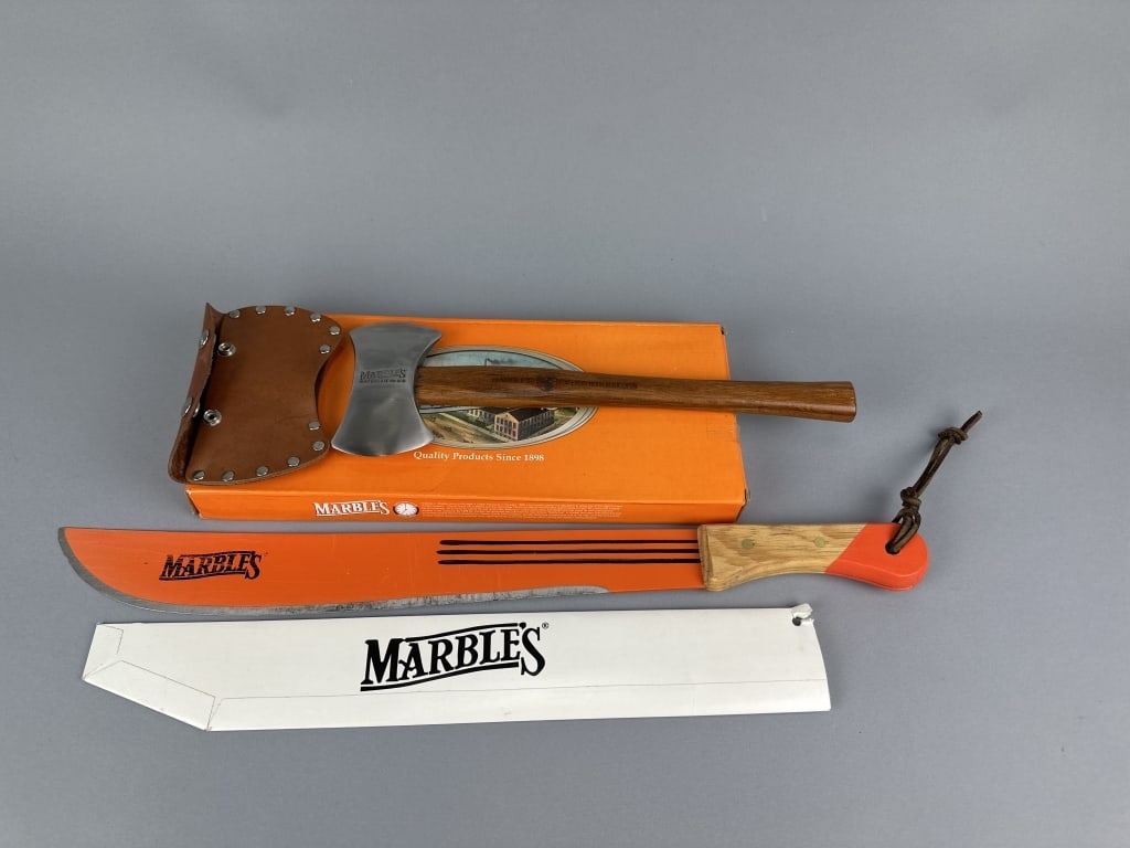 Marbles Hatchet & Machete: like new double-headed hatchet with original leather sheath & cardboard box, 15"L & machete with wooden handle, light use, 24"L, est. 200 - 300