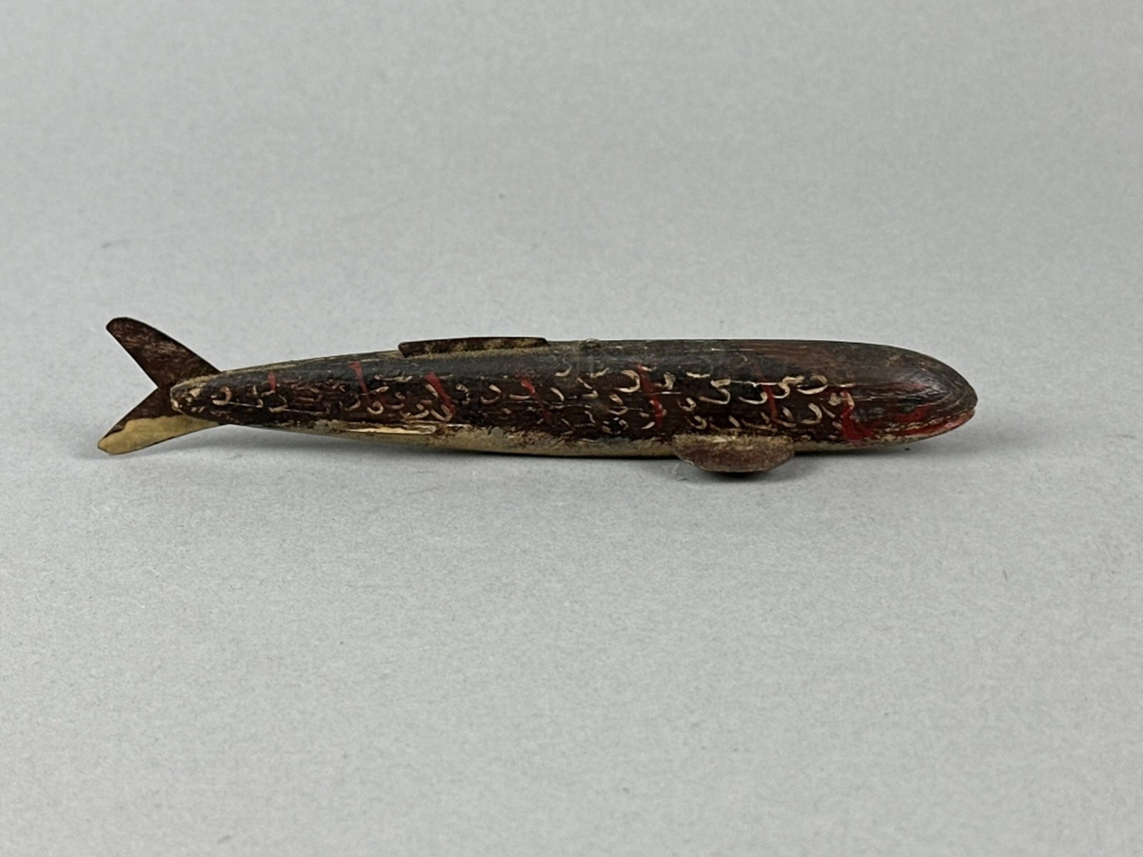 Fish Spearing Decoy Attributed to Henry Thomas: Michigan carver, not much information is known, painted eyes, metal tail & metal fins, 6.5"L, est. Market Determined