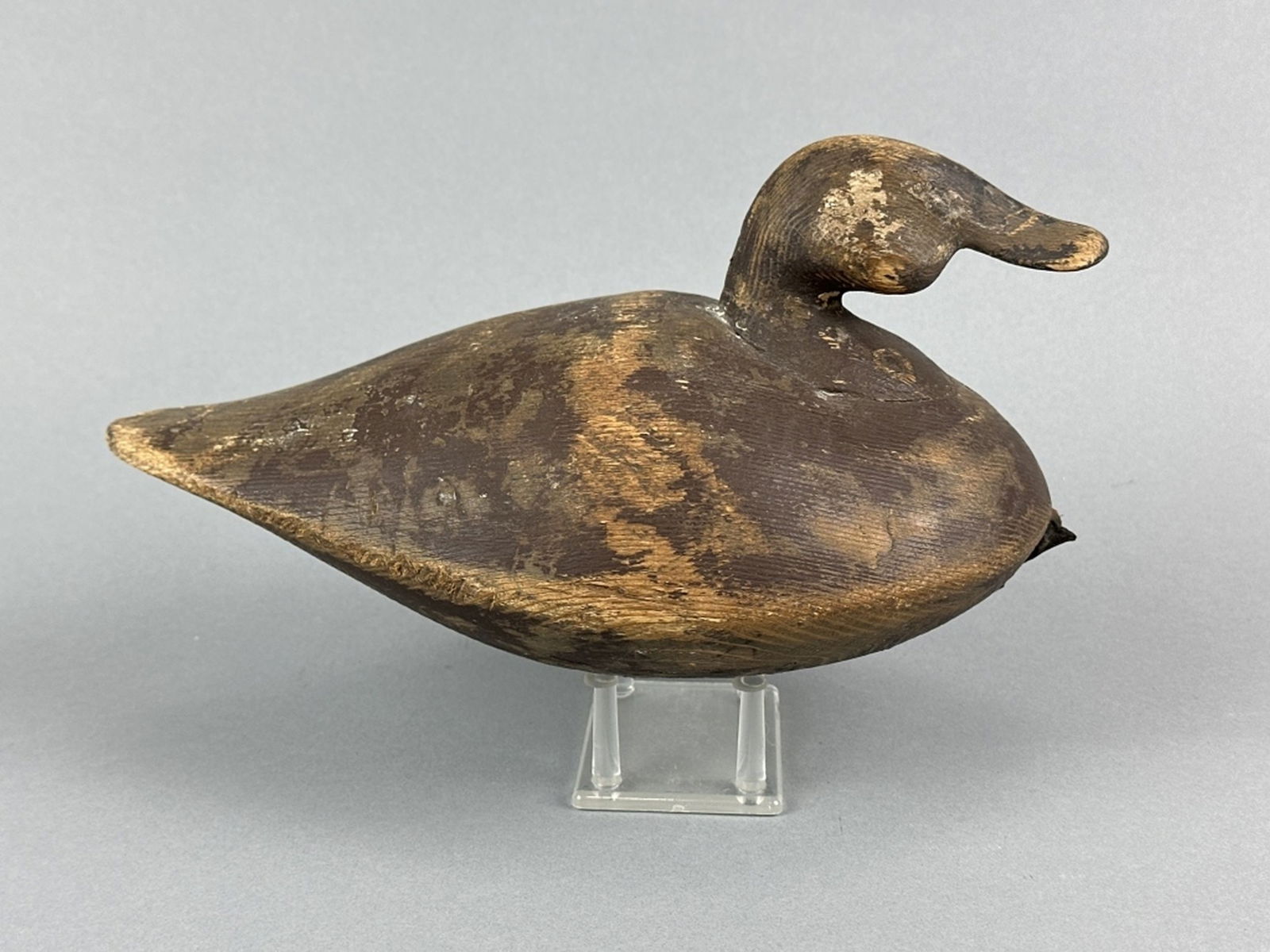 Reggie Birch Ruddy Duck Decoy: Chincoteague, VA, carved in the John Williams style, solid body, original paint with distressed wear, nice form, maker's name carved on bottom, 12"L, est. 250 - 450