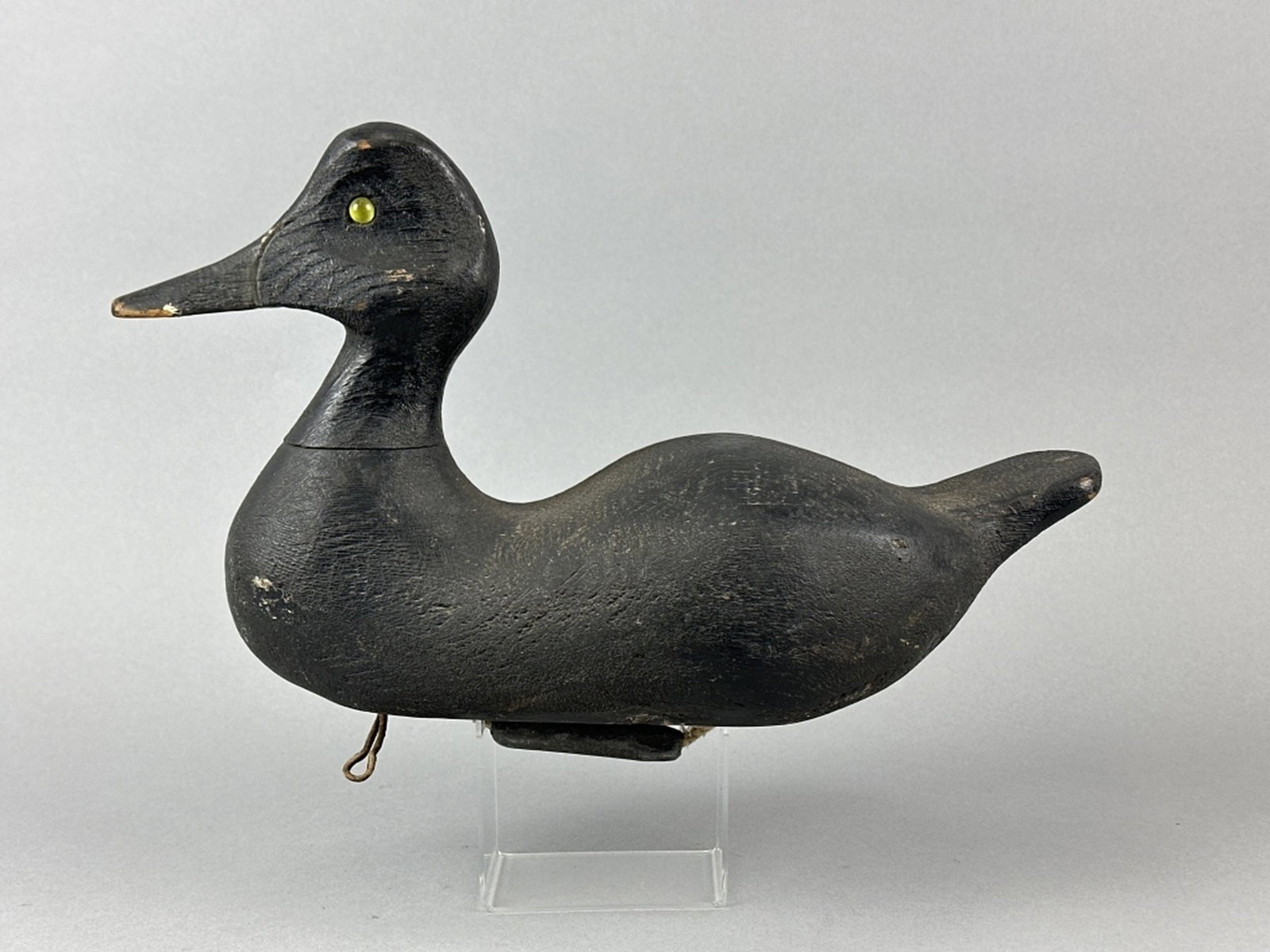 Roger Ebisch Black Duck Decoy: Erie, PA, glass eyes, solid body, original paint, some gunning wear & light paint loss, Greg & Alberta Mackey Collection, 15.5"L, est. 200 - 400