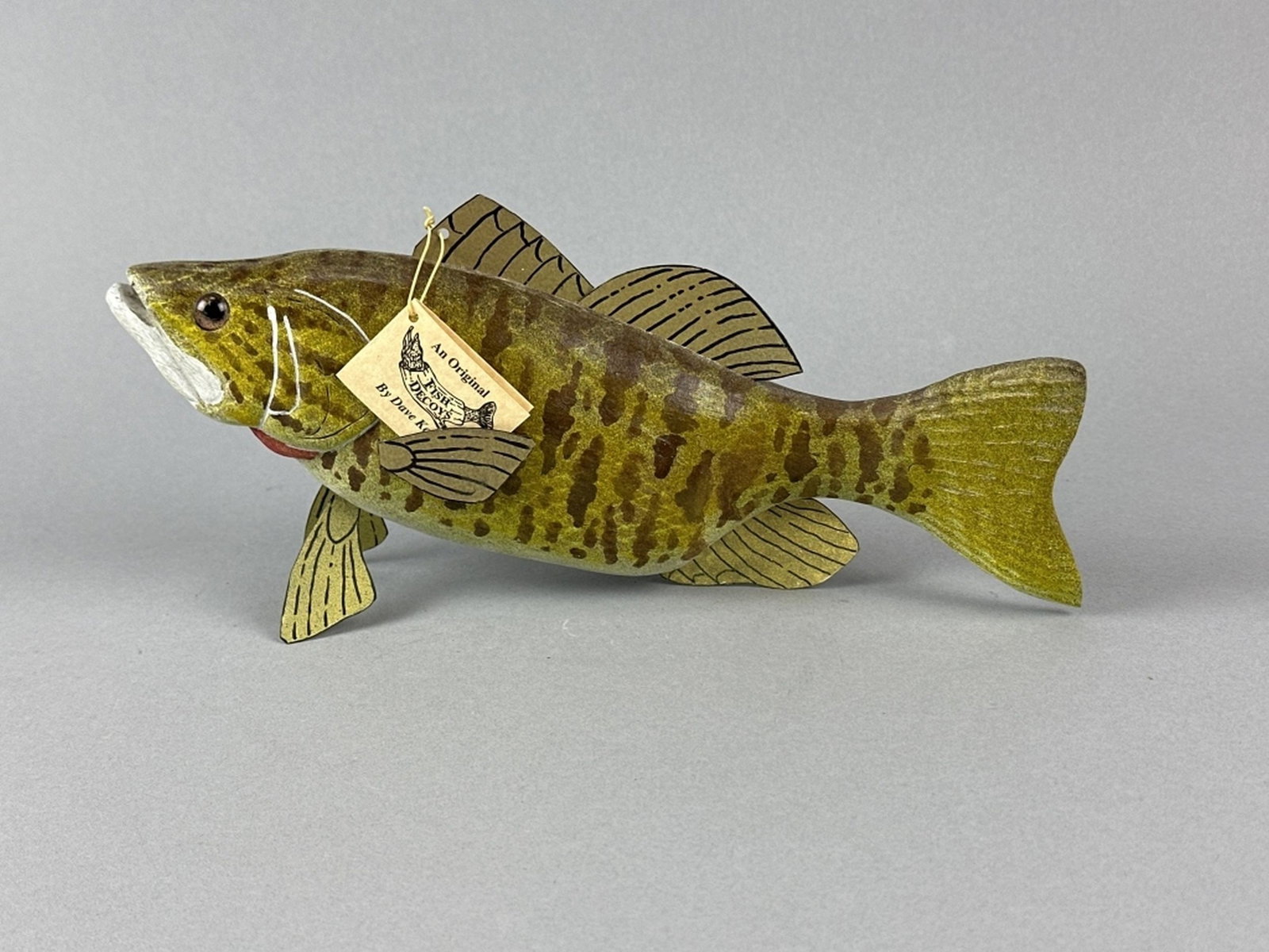 Dave Kober Hand Carved Small Mouth Bass: Beulah, MI, glass eyes, carved tail & metal fins, excellent condition, maker's signature on bottom, 11.5"L, est. 150 - 300