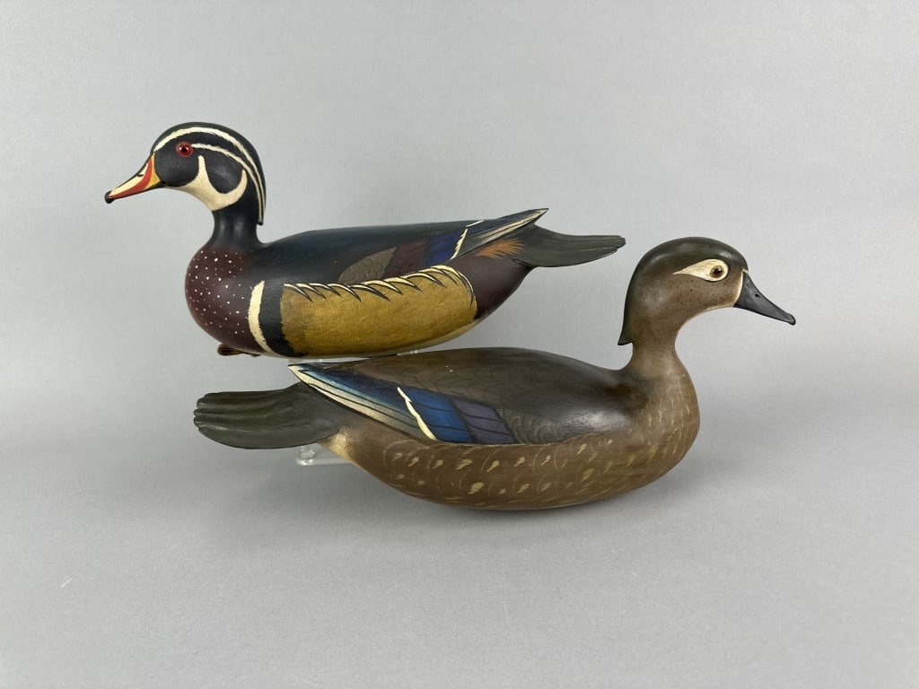Bob White Pr. of Wood Duck Decoys: Tullytown, PA, glass eyes, hollow bodies, mint original paint with nice patina, excellent form, heads are slightly turned, maker's signature & custom lead weight on bottoms, 16"L, est. 2,000-4,000