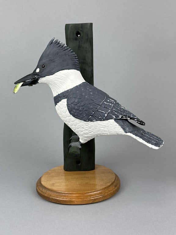 Bob Wiese Hand Carved Kingfisher: Cadillac, MI, glass eyes, solid body, excellent original paint, highly detailed carving with crossed wingtips, nice form with minnow in beak, maker's signature on bottom, kingfisher is 12"L, base is 1