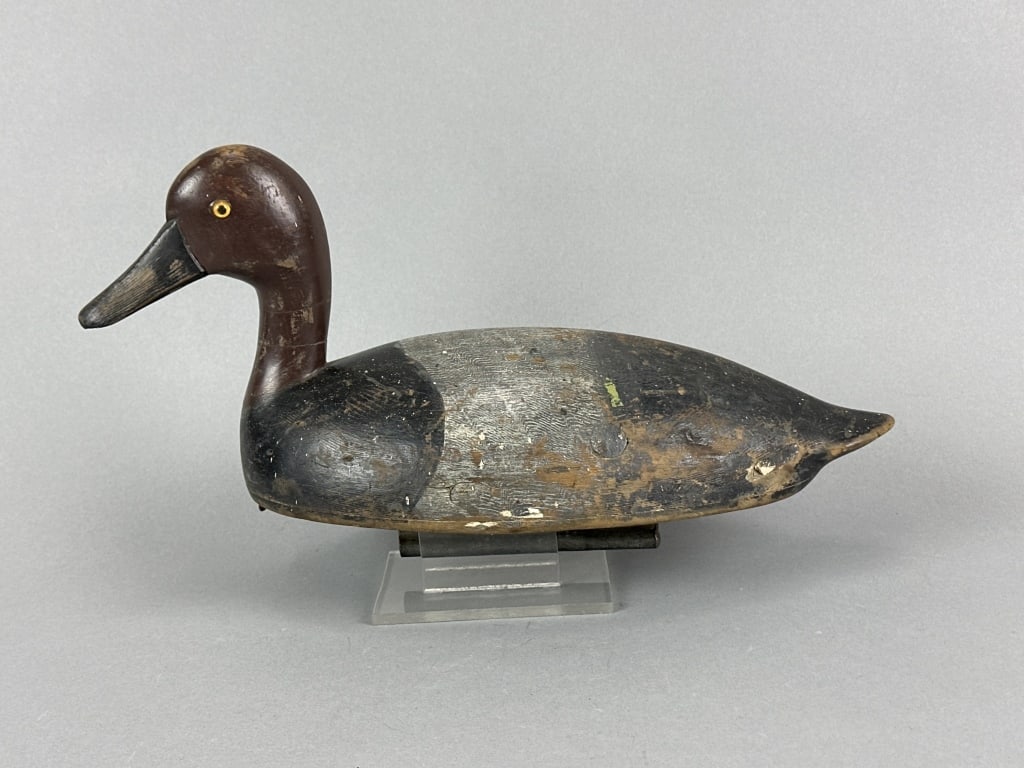 David Ward Attributed Redhead Drake Duck Decoy: Toronto, ONT, glass eyes, hollow body, combination of original & working paint, a few shot marks, gunning wear with areas of paint loss, 2 age cracks through neck, tight detailed combing on back & sid
