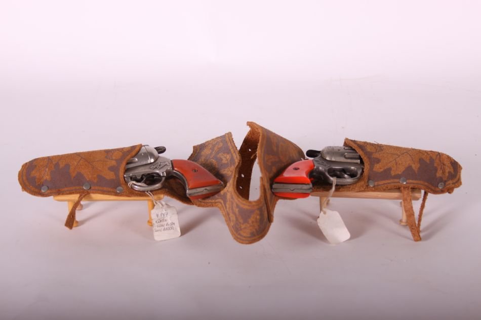 Pr of Kenton, Cast Iron, Gene Autry, Cap Guns, Red: Pr of Kenton, Cast Iron, Gene Autry, Cap Guns, Red Handles, Pair of Brown "Genuine Leather" Holsters w/ Leather Belt