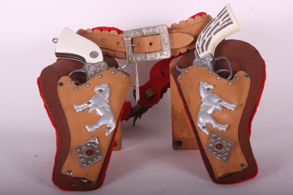 Pr of Esquire-Actoy, Die Cast, Pony Boy Cap Guns, One: Pr of Esquire-Actoy, Die Cast, Pony Boy Cap Guns, One w/ White and Black Handle, One w/ White Handle w/ Horse Inset, W/ Leather Double Holster and Belt