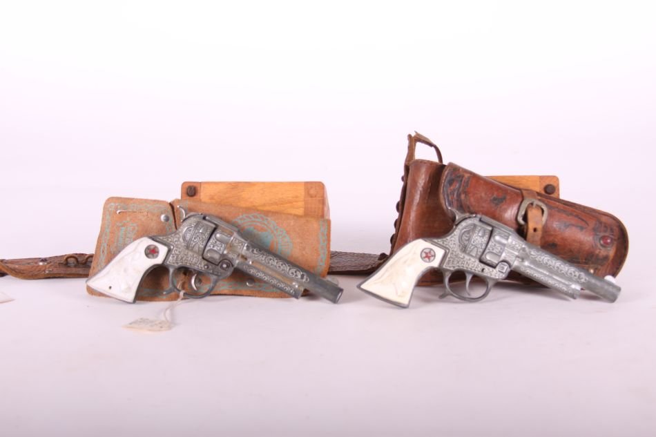 Pr. Of Hubley, Die Cast, Texan Jr. Cap Guns w/ White: Pr. Of Hubley, Die Cast, Texan Jr. Cap Guns w/ White Steer Head Grips, w/ One Holster and Belt and One Non-Matching Holster