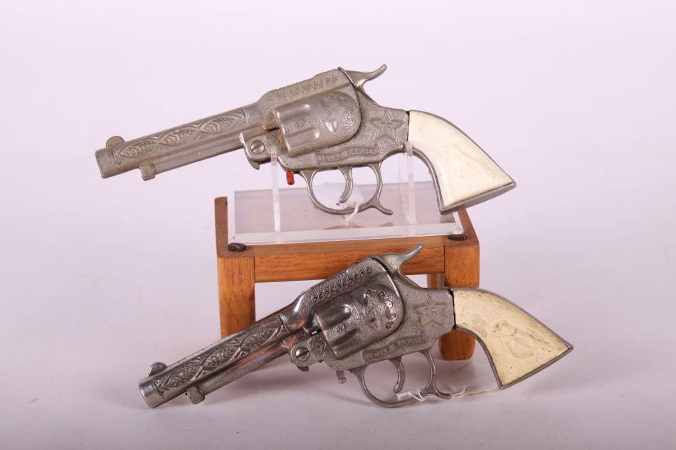 Pr. Of Leslie Henry, Die Cast, Texas Ranger Cap Guns,: Pr. Of Leslie Henry, Die Cast, Texas Ranger Cap Guns, w/ White Horse-Head Grips