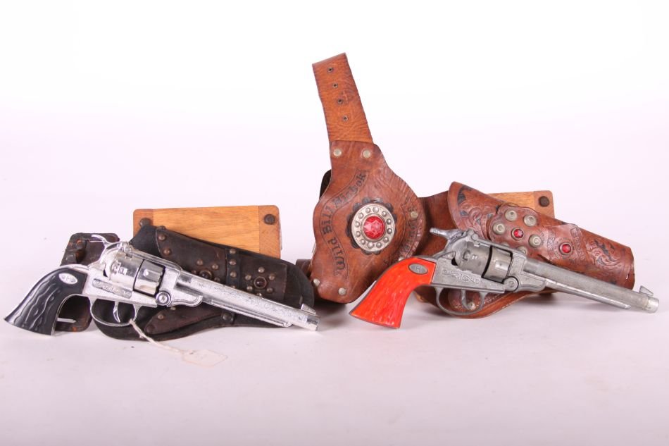 Pr. Hubley Cap Guns, Unnamed, Die Cast, One w/ Black: Pr. Hubley Cap Guns, Unnamed, Die Cast, One w/ Black Grips, One w/ Red Grips, w/ Black Leather Holster and Brown 'Wild Bill Hickock and Texas Ranger' Leather Holster and Belt