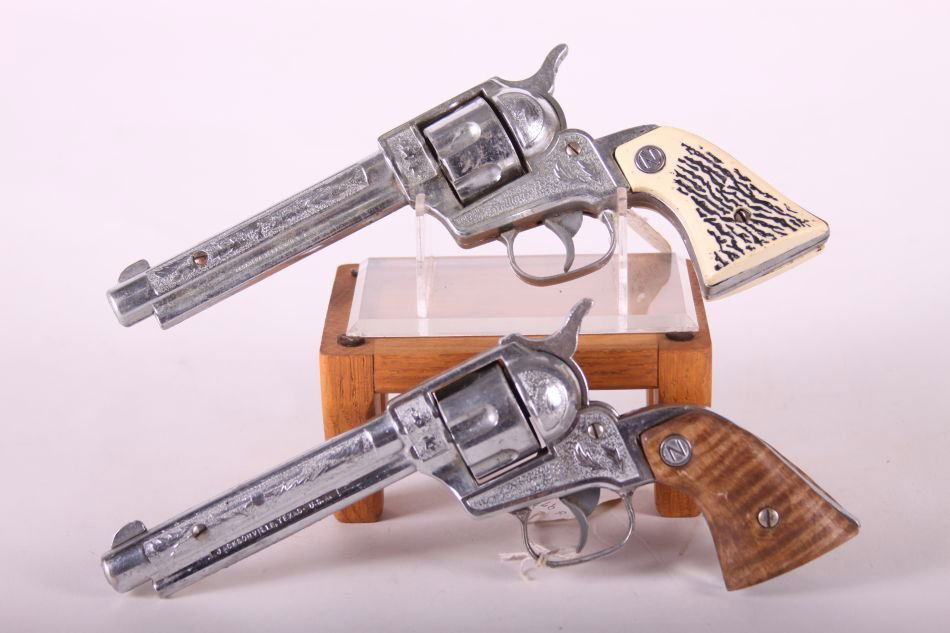 Pr.Of Nichols Stallion .38 Cap Guns, Die Cast, One w/: Pr.Of Nichols Stallion .38 Cap Guns, Die Cast, One w/ Black and White Grips, One w/ Brown Wooden Grips