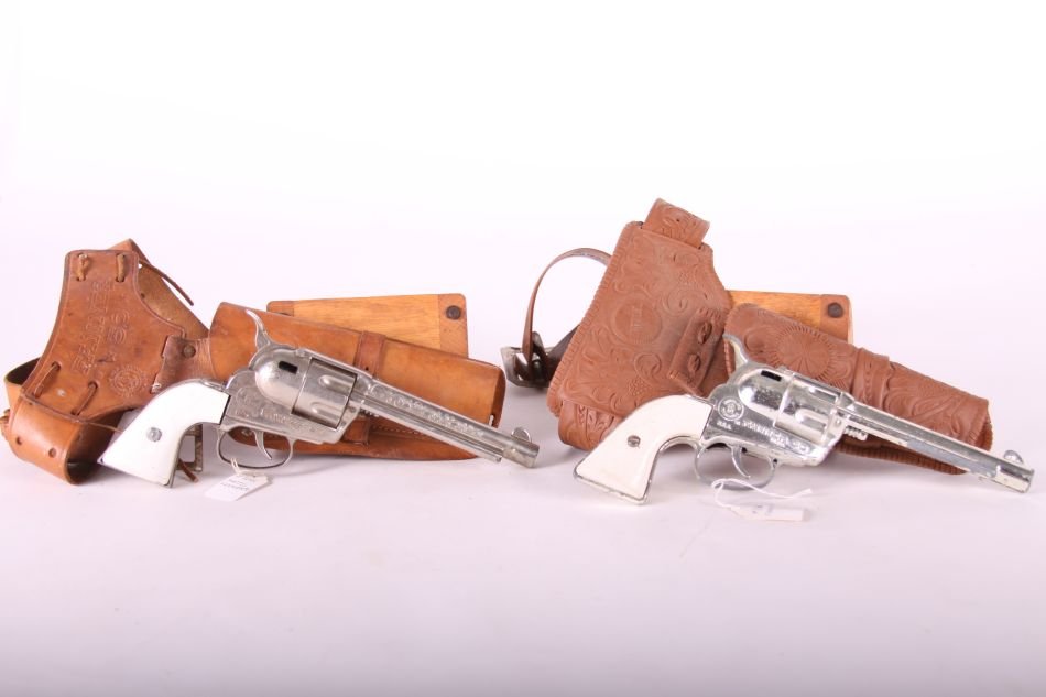 Pr. Of Mattel Fanner, Die Cast, 50 Cap Guns, White: Pr. Of Mattel Fanner, Die Cast, 50 Cap Guns, White Grips, w/ Two Holsters and Belts, One Leather Fanner 50, One Plastic Mattel