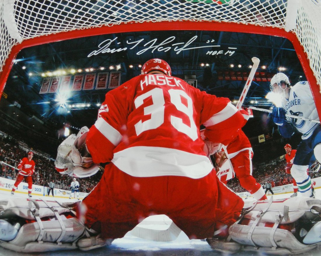 Dominik Hasek signed Detroit Red Wings action 16x20 pho: dominik hasek signed detroit red wings action 16x20 photo with 'hof 14' inscription. item comes with a memorabilia tamper-proof numbered hologram and certificate of authenticity which can be verified 