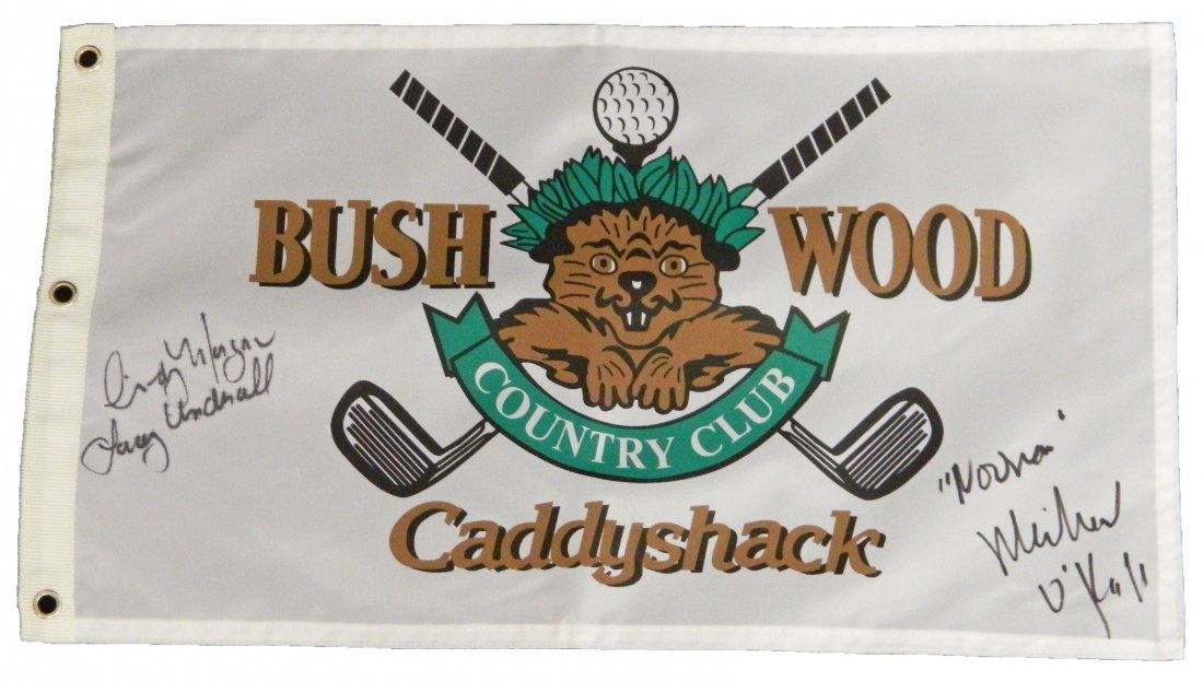 Cindy Morgan and Michael O'Keefe dual signed Caddyshack: cindy morgan and michael o'keefe dual signed caddyshack beaver logo bushwood flag with 'lacey underall' and 'noonan' inscriptions. item comes with a memorabilia numbered tamper-proof hologram and cert