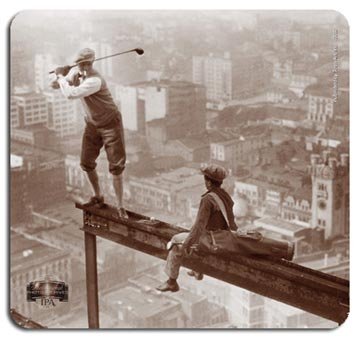 Mousepad - Swing Under Construction: This photo non-skid mouse pad entitled "Swing Under Construction" taken in the early 20's features golfer Buddy Mason driving a ball from the 18-story "course" atop Los Angeles City Hall, which is und