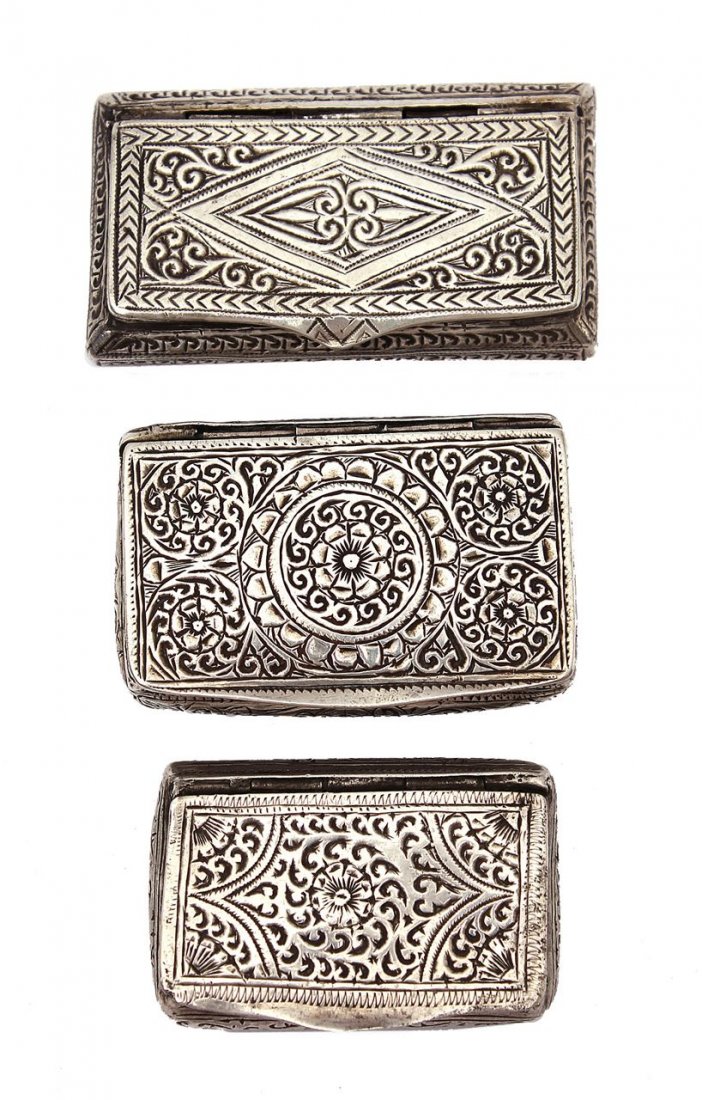 Lot of 3 tobacco boxes—silver, North Africa.: Handworked engraving of plants, flowers, and decorations, (silver not stamped). Total weight: 155g, different sizes and conditions.