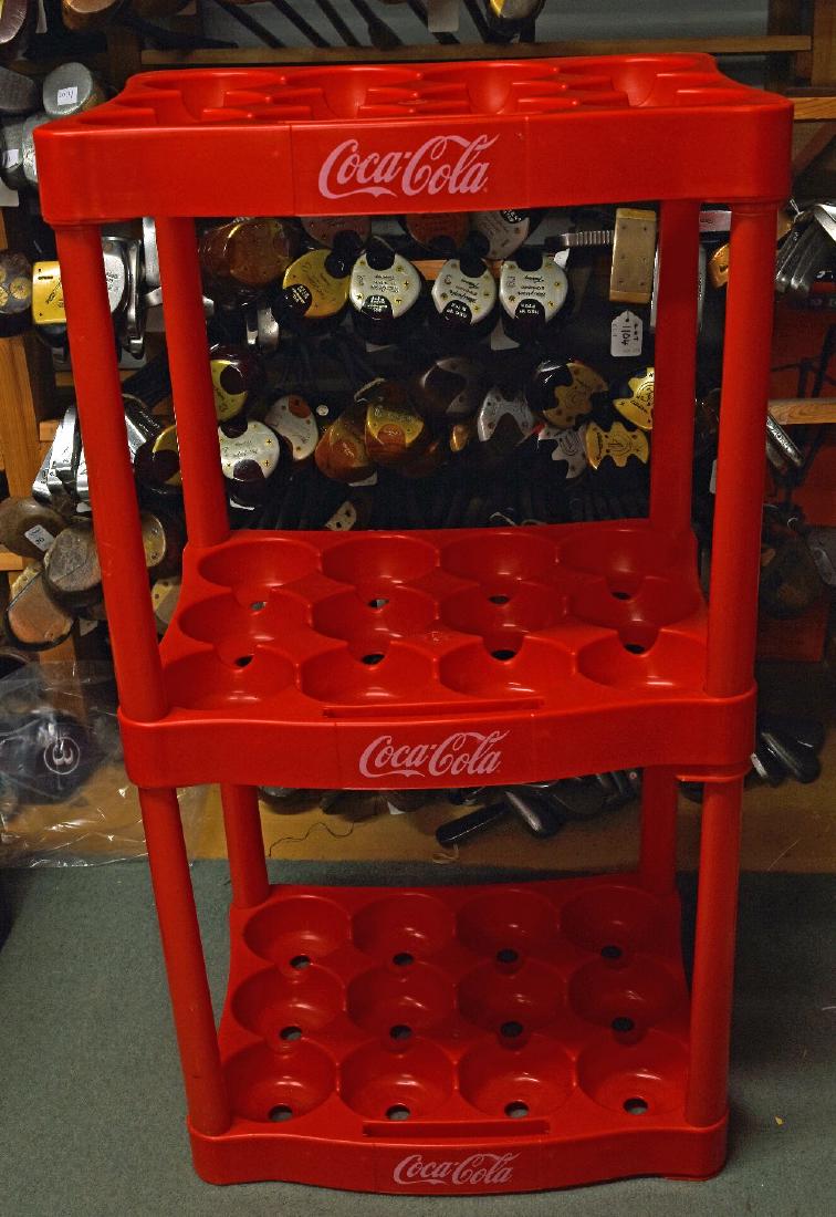 Coke Cola Shop Display Stand a Three tier...: Coke Cola Shop Display Stand a Three tier plastic stand which holds 36 2ltr bottles (great storage for a modern kitchen), measures 83cm h approx.